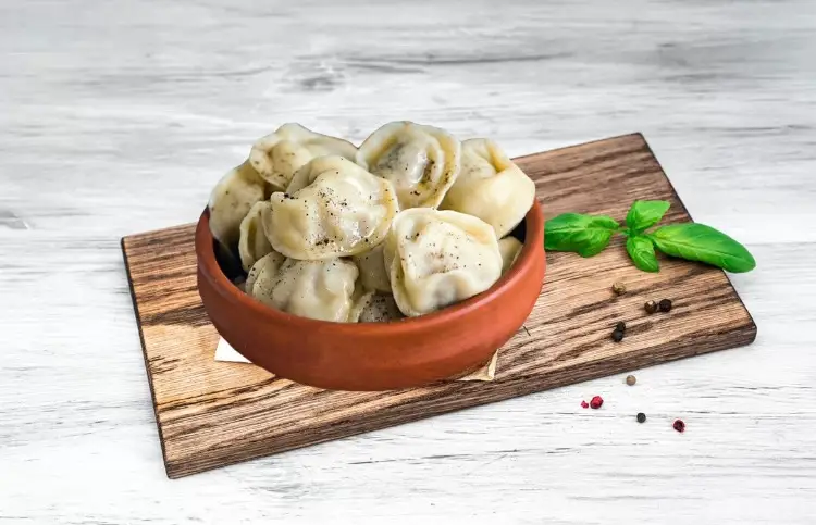 Пельмені зі свининою та сметаною 250г_50г 90₴